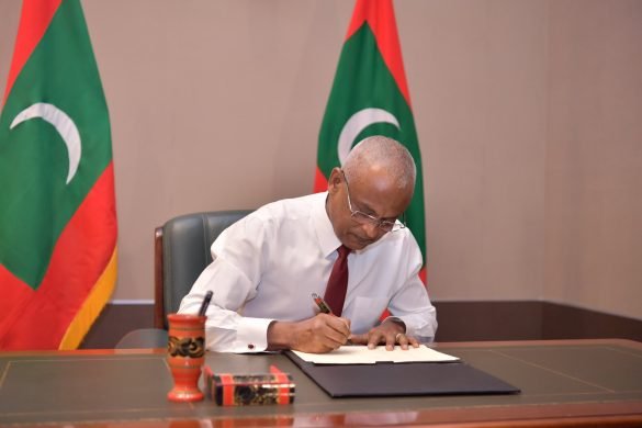 President Ibrahim Mohamed Solih signs two election-related amendment bills into law on Thursday (Photo: President's Office)