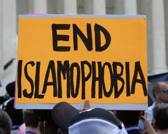 A protester holding a placard (Photo: Shutterstock)