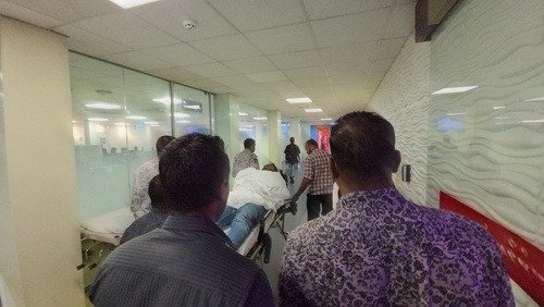 Ahmed Adheeb being escorted into Indira Gandhi Memorial Hospital (IGMH) for medical treatment (Photo: Twitter/MvCrises)