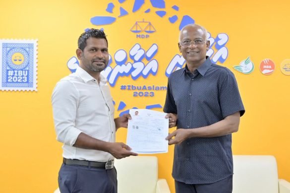 MP Hassan Shiyan hands over his membership form to President Solih (Photo: MDP)