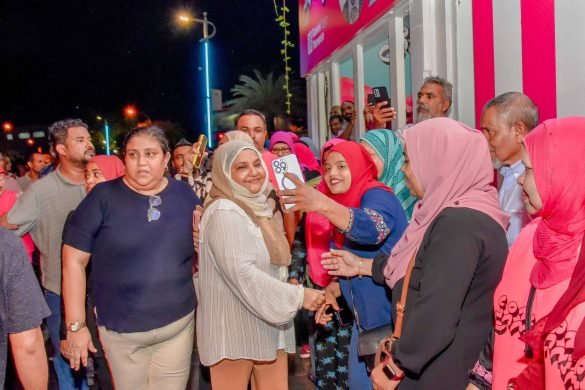 Former First Lady Fathimath Ibrahim outside the PPM-PNC's main campaign hub near Alimas Carnival in Male’ City (Photo: X/ @ProgressPartyMV)