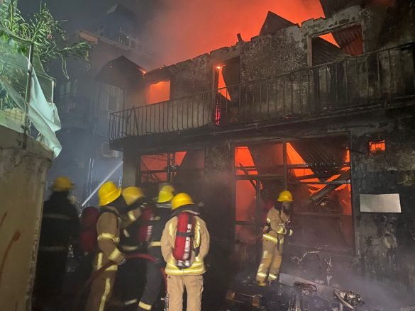 Firefighters work to put out the fire that broke out in ‘Vega Point’ shop in Galolhu, Male’ City on Wednesday. (Photo: MNDF)