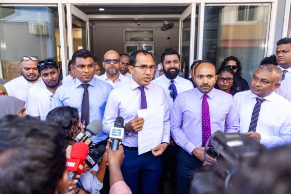 The People’s National Front (PNF) representatives Dr Mohamed Jameel Ahmed and Mohamed Maleeh Jamal speak to reporters outside the Elections Commission (EC) offices on Wednesday, 29 November 2023. | Photo: PNF