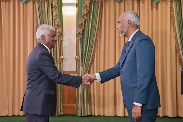 President Mohamed Muizzu shakes hands with Mohamed Fahmy Hassan after his appointment as the Minister of State for Foreign Affairs. | Photo: The President's Office