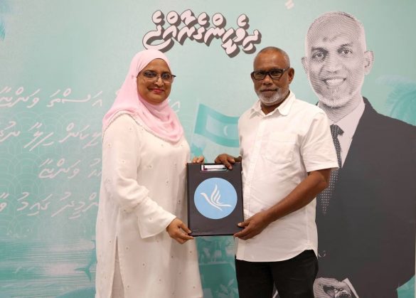 Former Attorney General Azima Shakoor hands in her candidacy papers to the PNC Chairman Abdul Raheem Abdulla. | Photo: X/@AzimaforMayor